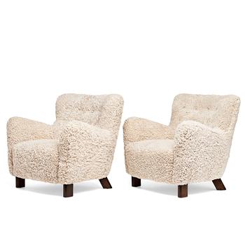 Fritz Hansen, a pair of "1669" easy chairs, Fritz Hansen Denmark 1940´s.