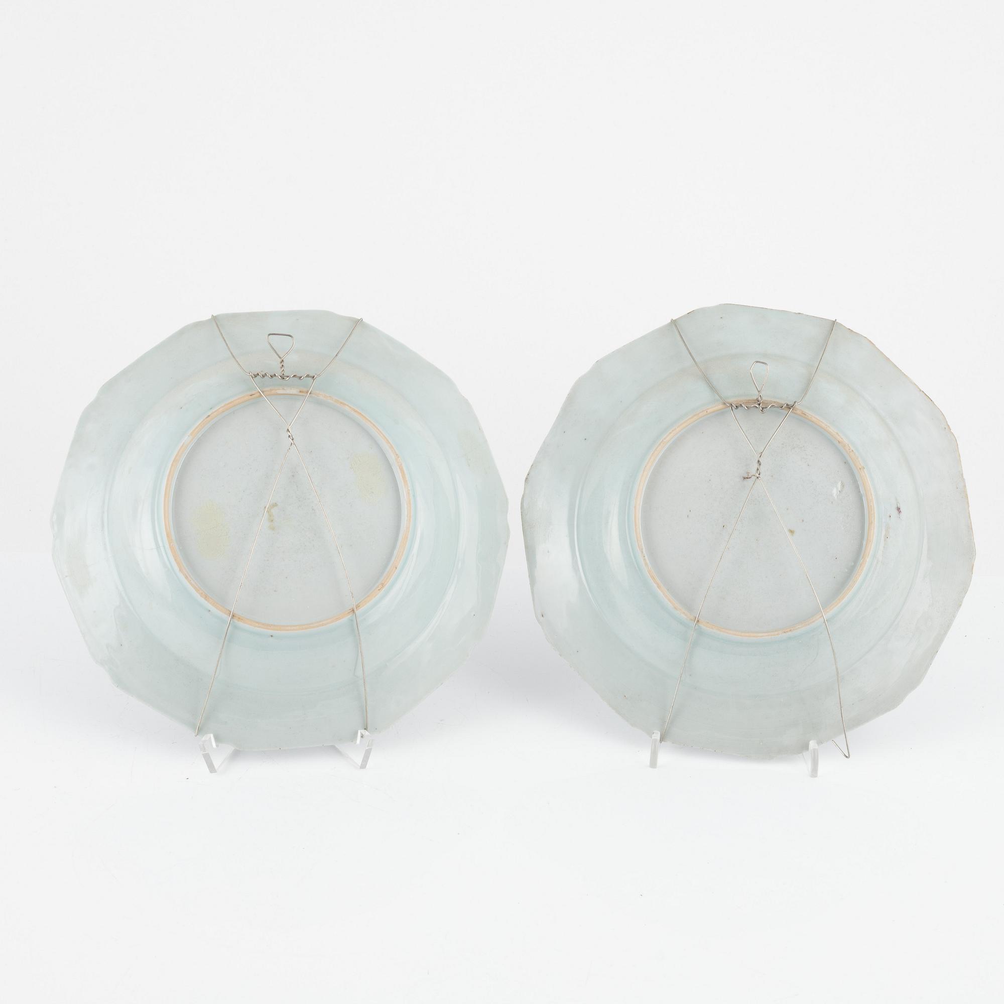 A set of 15 famille rose dinner plates, Qing dynasty, Qianlong and one Canton 19th Century.