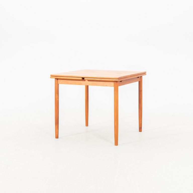 A teak table from the middle of the 20th century.