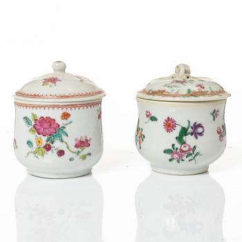 A group of 12 CHinese famille rose porcelain custard cups with covers, Qing dynasty, 18th century.