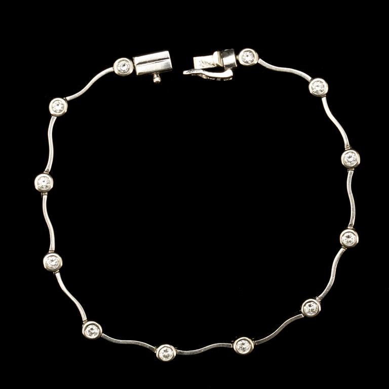 ARMLÄNK, 14k vitguld med briljantslipade diamanter ca 0,96 ct. Vikt 8g.