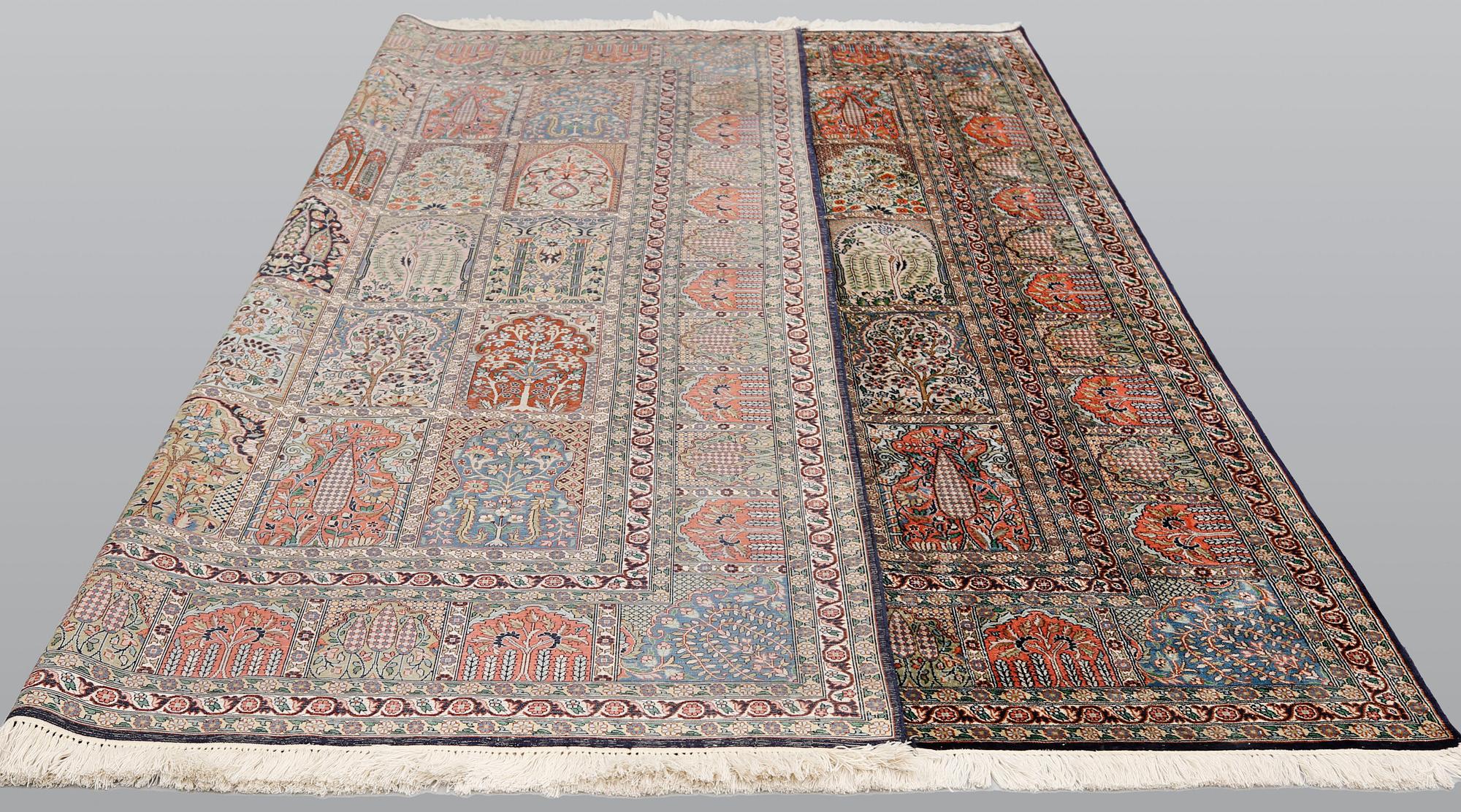 A silk Kashmir carpet, 286 x 265 cm.
