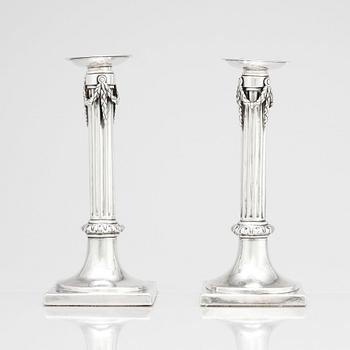 A pair of German 18th century silver candlesticks, marks of Johann Philipp Heckenauer, Augsburg 1787-1789.