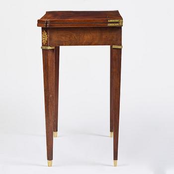 A Gustavian 'concertina action' mahogany games table by Georg Haupt (master in Stockholm 1770-84).