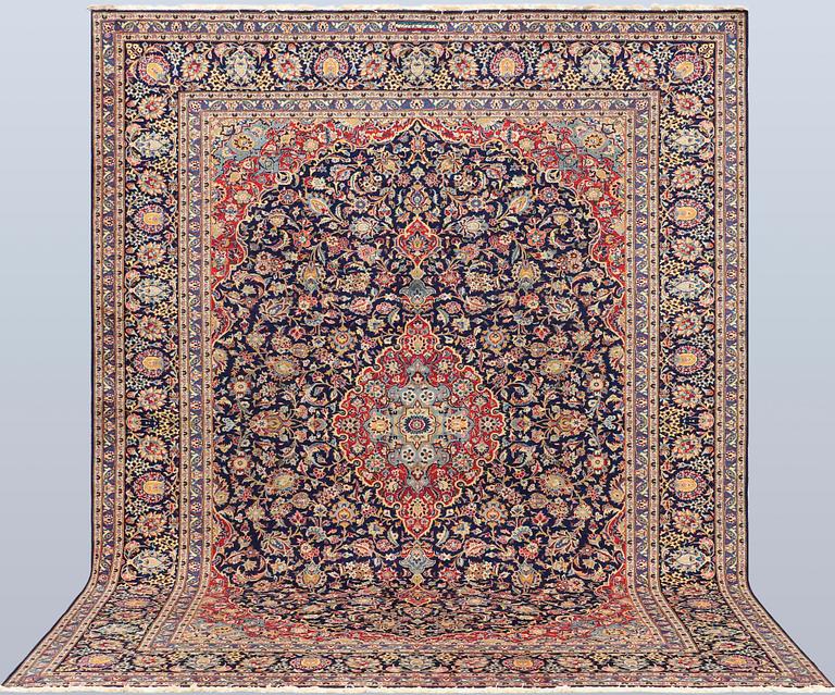 A Keshan carpet, 338 x 264 cm.