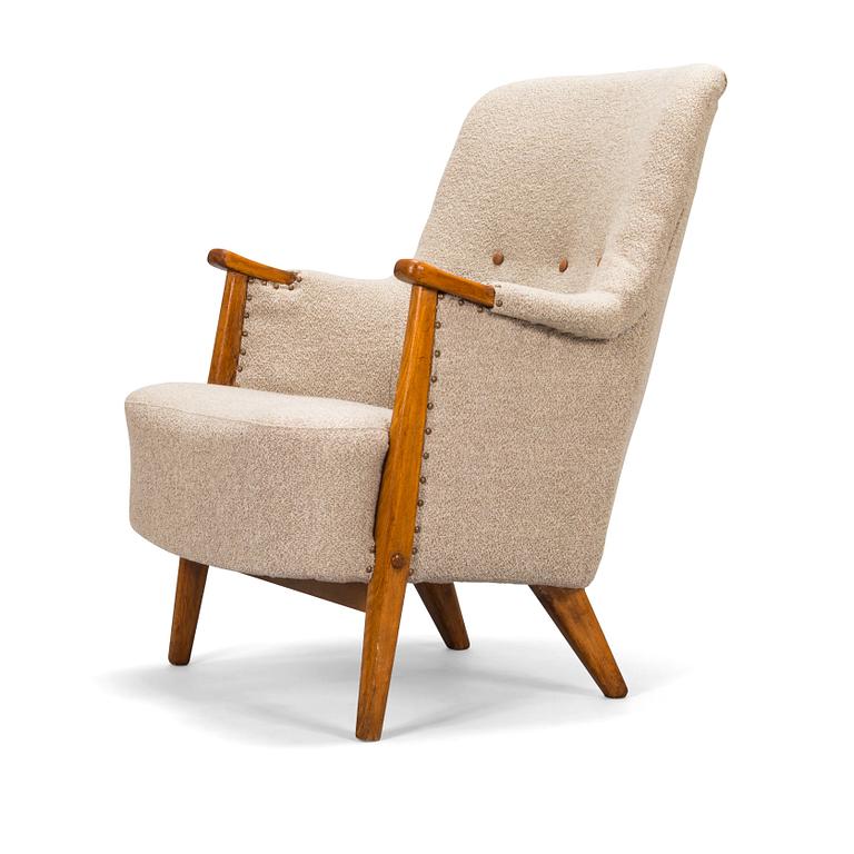 Olof Ottelin, a 1950's 'Pompadour' armchair for Oy Stockmann Ab, Keravan puusepäntehdas.