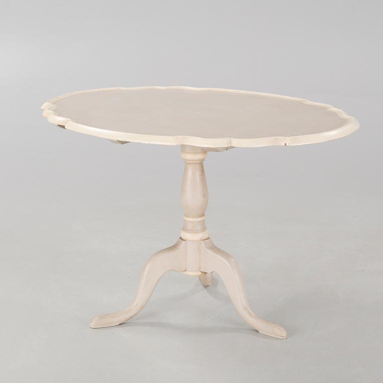 A late 19th century drop-leaf table.