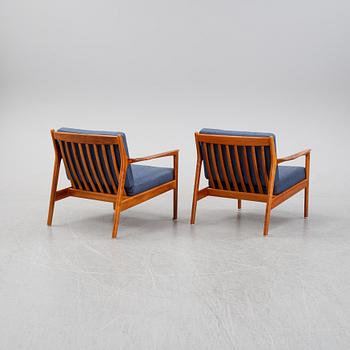 Folke Ohlsson, a pair of teak 'USA 75' easychairs, Dux, designed in 1963.