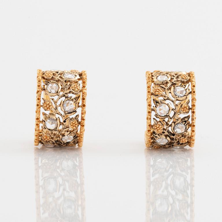 A pair of 18K gold Buccellati earrings set with rose-cut diamonds.