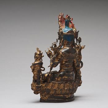 A bronze sculpture of boddhisattva and two attendants, Ming dynasty (1368-1644).