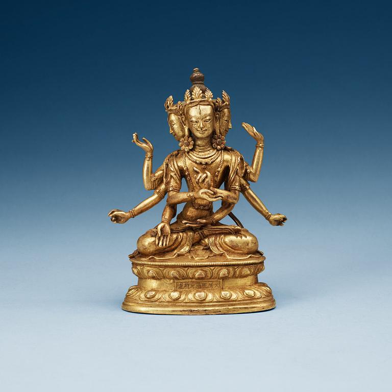 A Sino-Tibetan bronze figure of Ushnishaijaya, with Qianlong mark, late Qing dynasty.