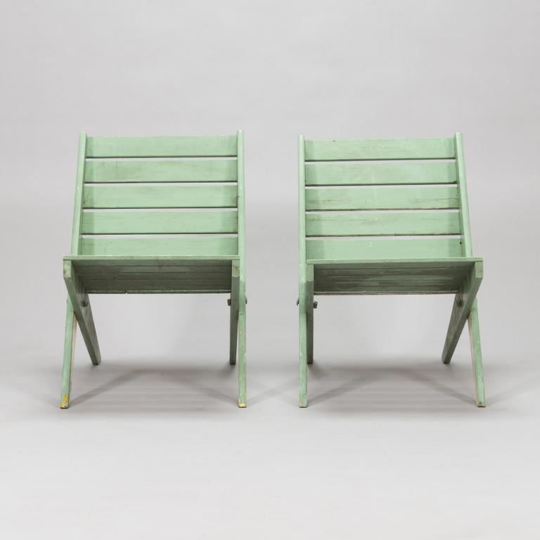 A pair of mid-20th century garden chairs.