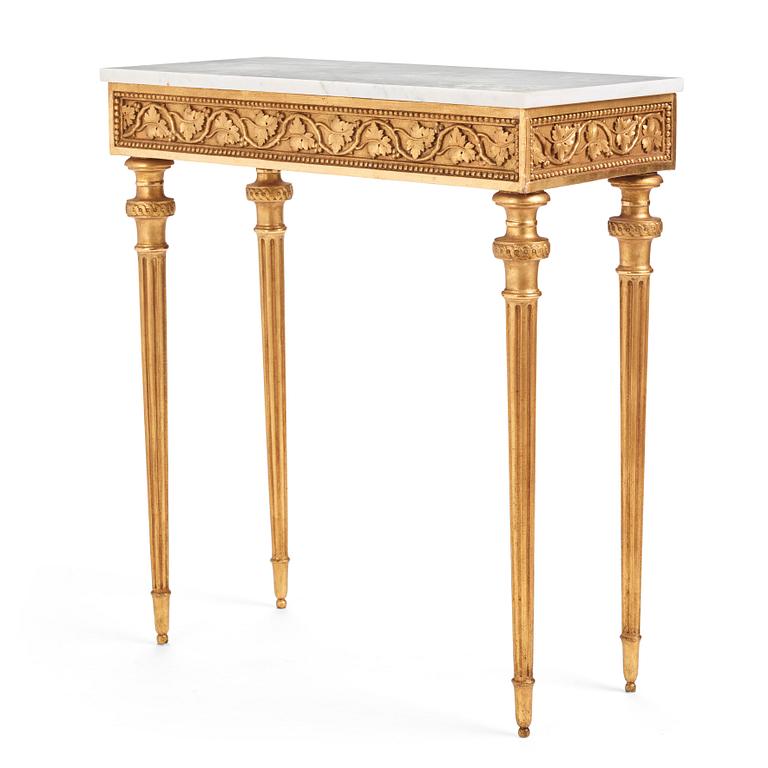 A late Gustavian carved giltwood and marble console table attributed to P. Ljung (1743-1819).