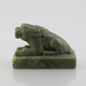 A Chinese stone figure of a lion, 20th century.