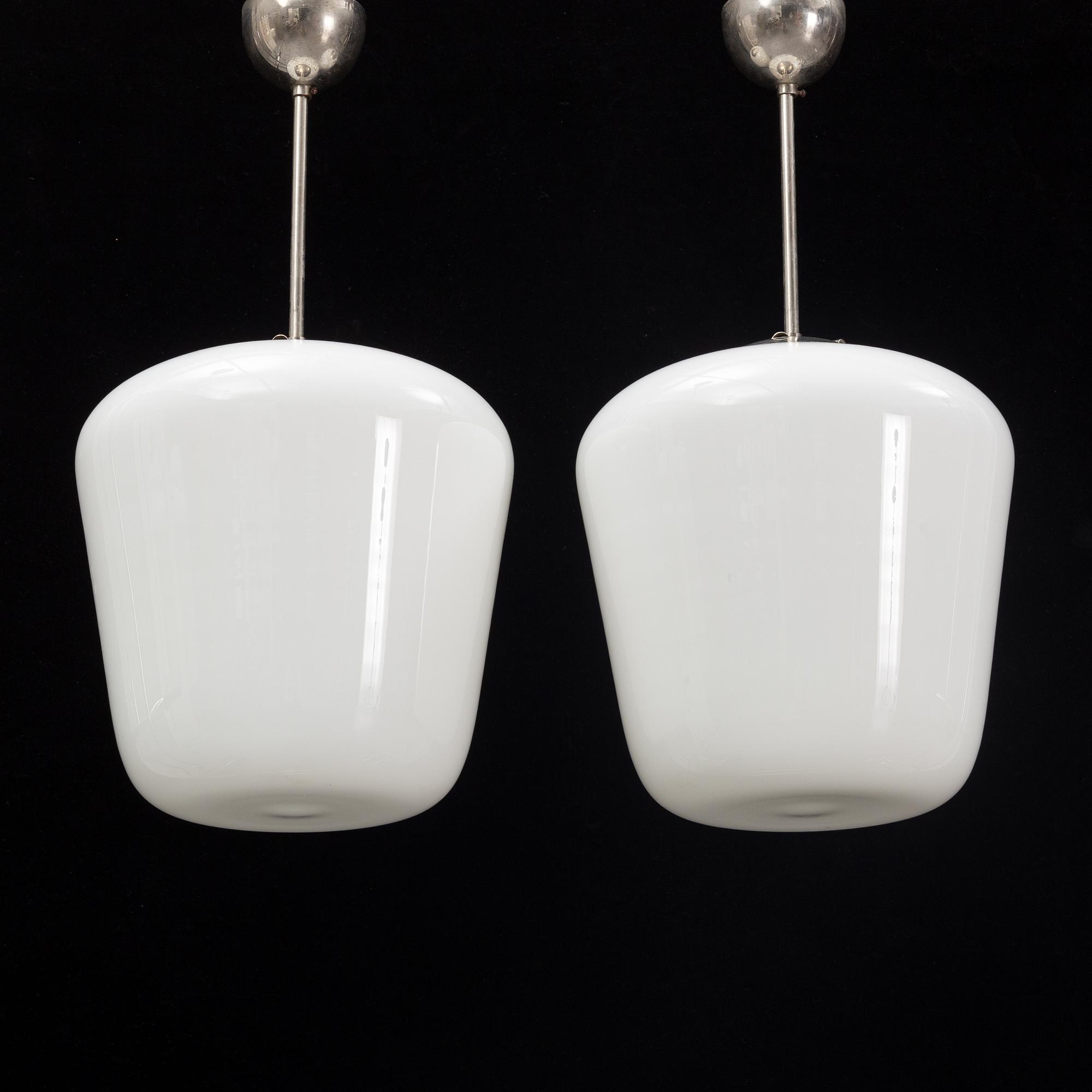 A pair of 1930's-40's ceiling lights.