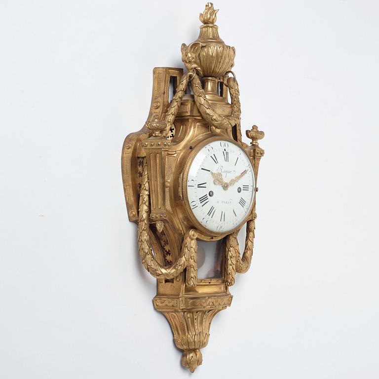 A Louis XVI gilt bronze wall clock by Jean Joseph Léonard Roque, active 1770-89.