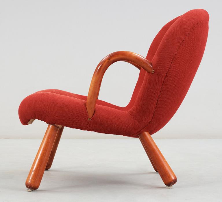 A 1940's-50's 'Clam chair' attributed to Philip Arctander for Möbelstil, Jönköping, Sweden.