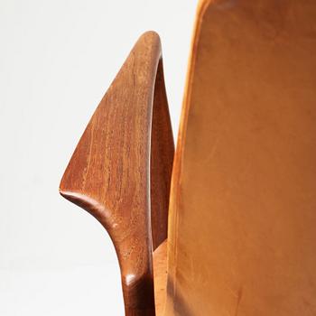 Ib Kofod-Larsen, a "Seal" teak and brown leather armchair, Olof Persson Möbler, Jönköping, Sweden 1950-60's.
