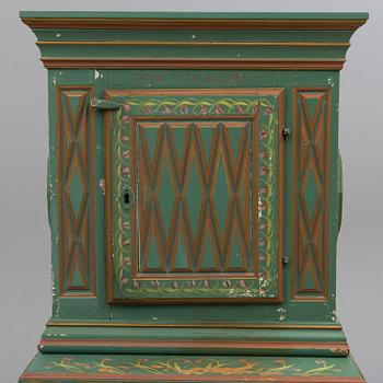 A second half of the 19th century wall cabinet with stand.