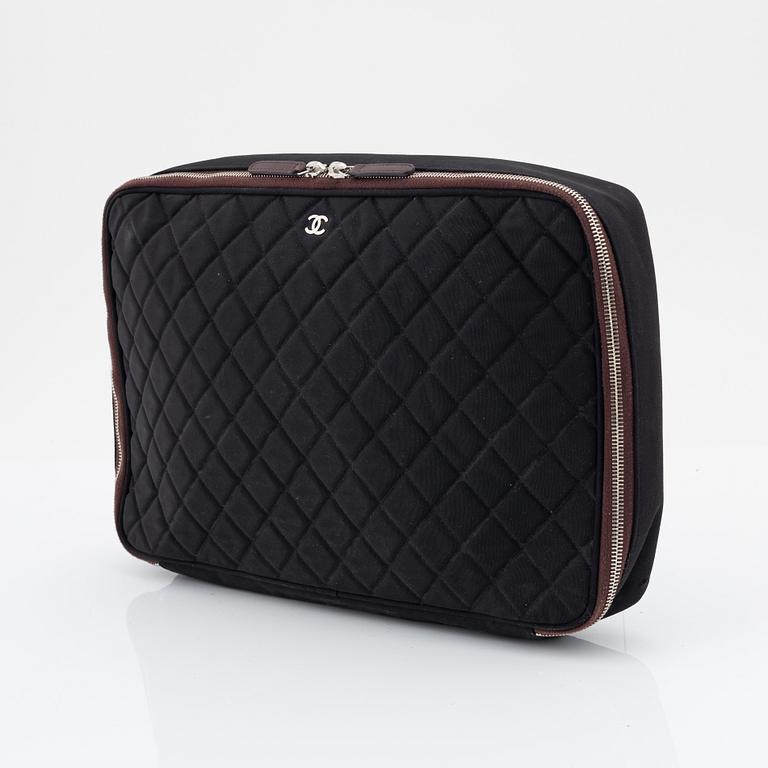 Chanel, a quilted nylon computer case, 2012.