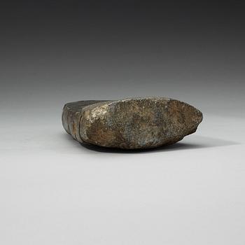 A carved Tibetan votive placque.