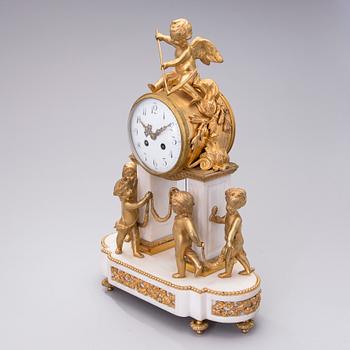 A neoclassical, French mantel clock, ca 1840-1860.