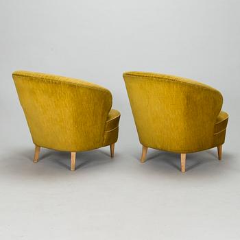 A set of three armchairs, mid-20th century.