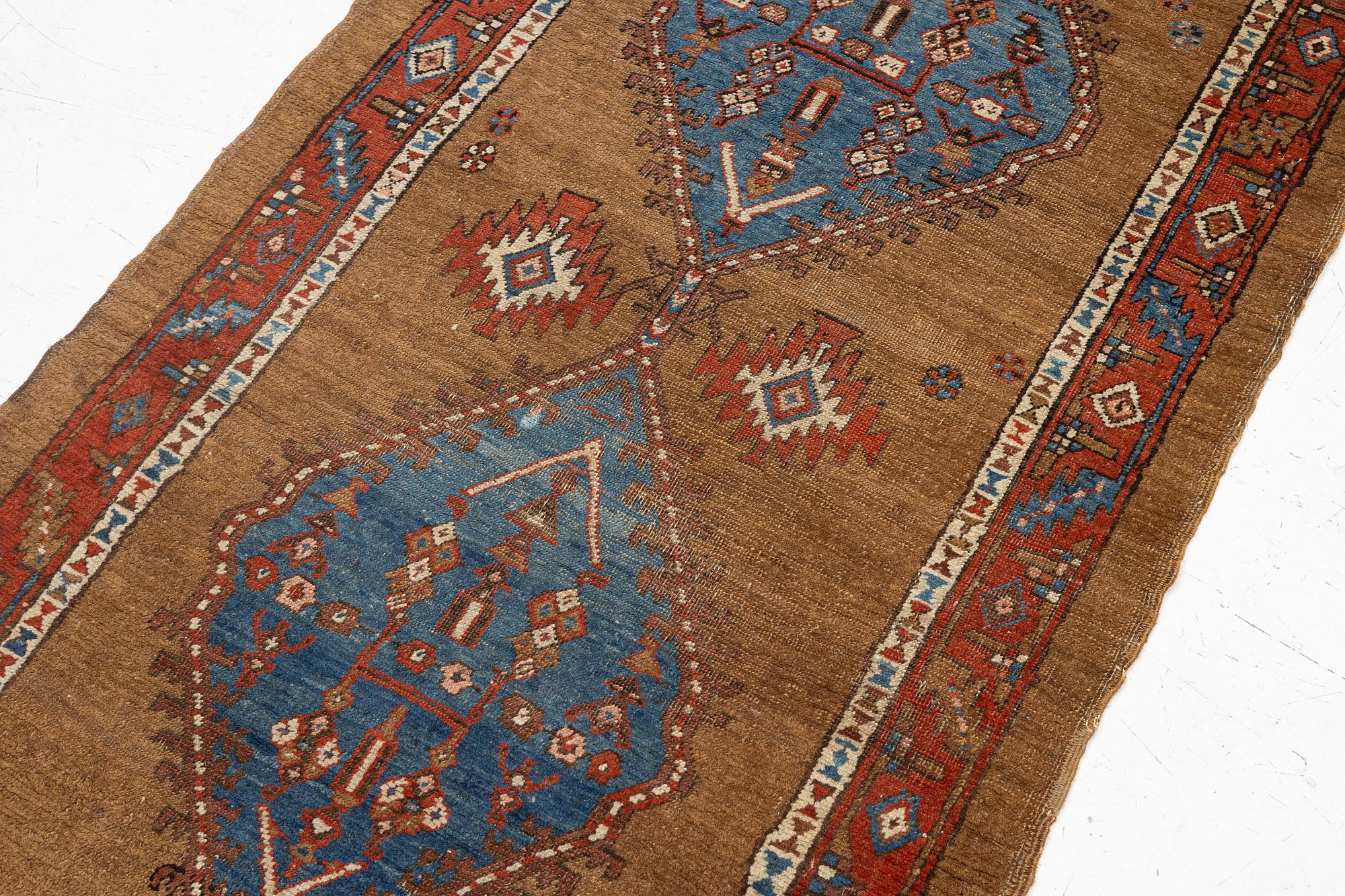 An antique Sarab rug, northwestern Iran, c. 213 x 107 cm.