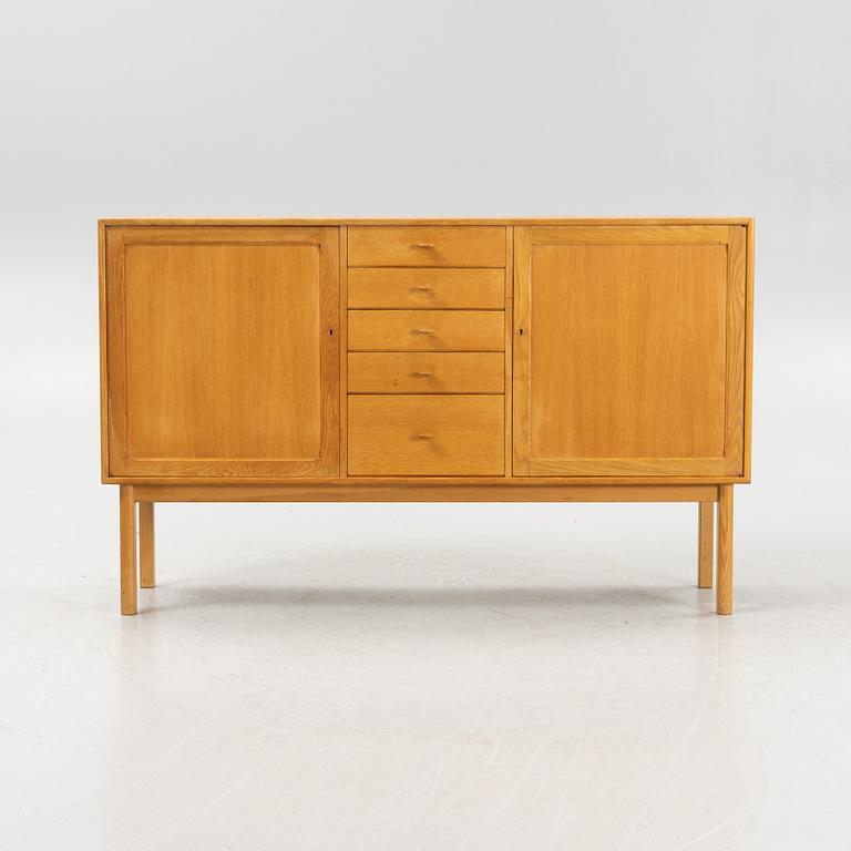 Sven Engström och Gunnar Myrstrand, an oak veneered sideboard, for Bodafors, dated 1962.