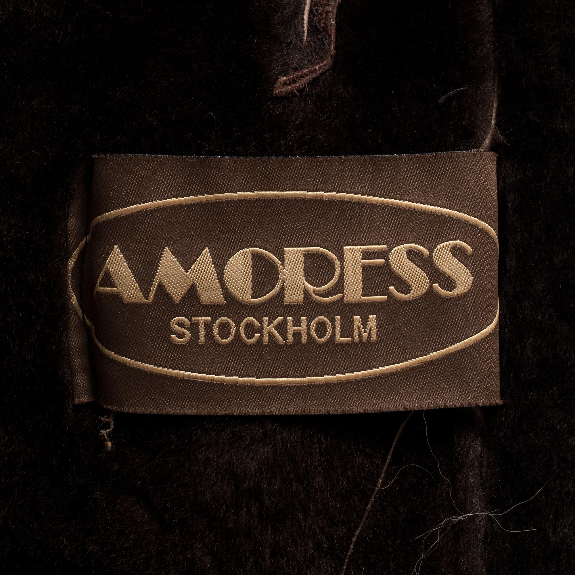 A fur and leather jacket by Amoress, in size app 36.