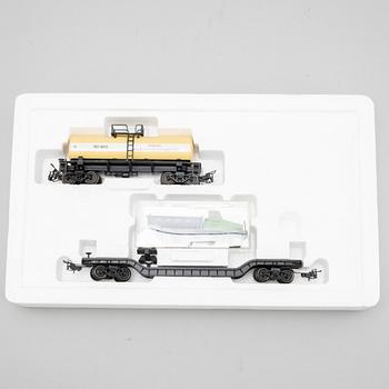 Märklin, engines and traincars, scale H0, in boxes.