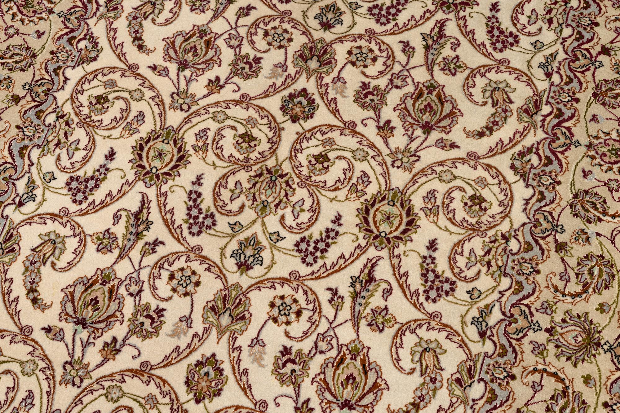 An Isfahan part silk rug, c. 161 x 110 cm.