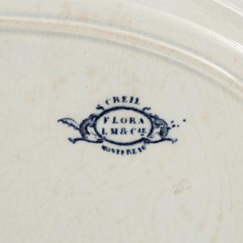 A 42 piece earthenware dinner service, 'Flora', Creil Montereau, France, late 19th Century.