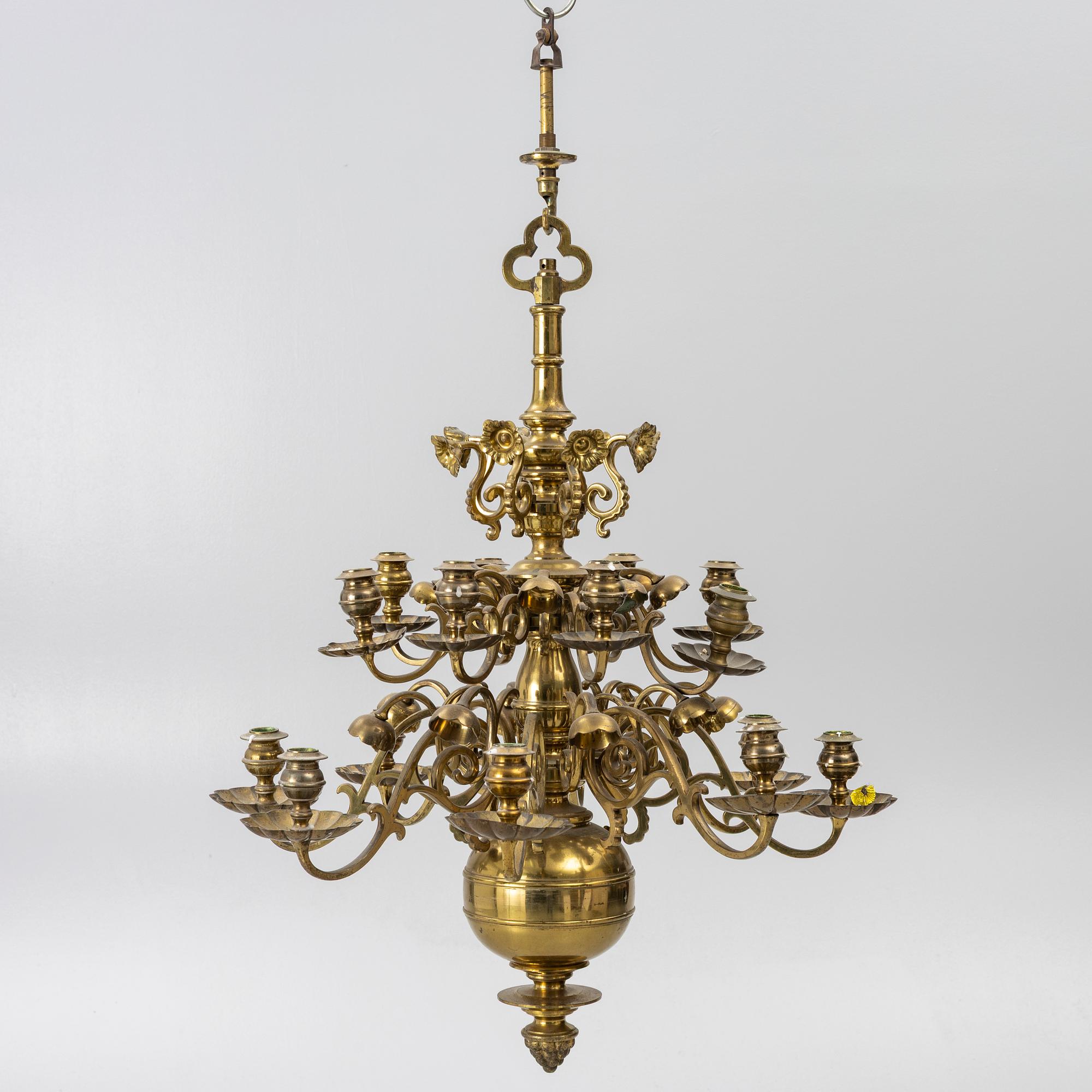A Baroque style brass chandelier, 20th century.