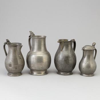 Four 18th century pewter jugs.
