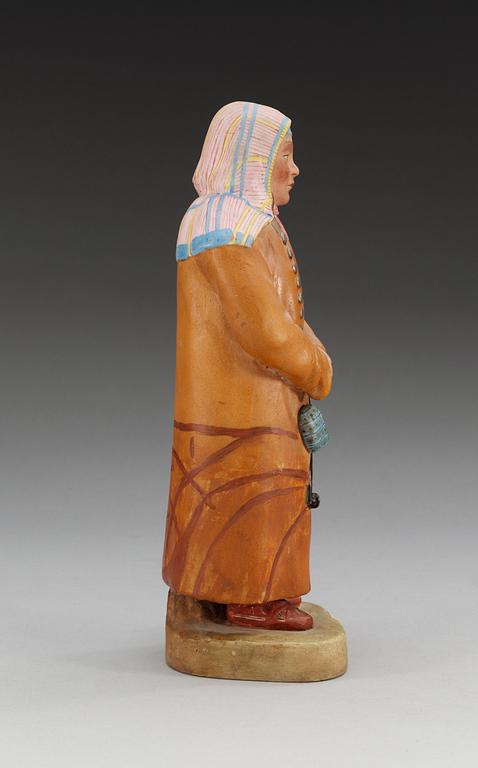 An unmarked Russian bisquit figure depicting a man from Obdorsk (Salekhard), first half of 20th Century.