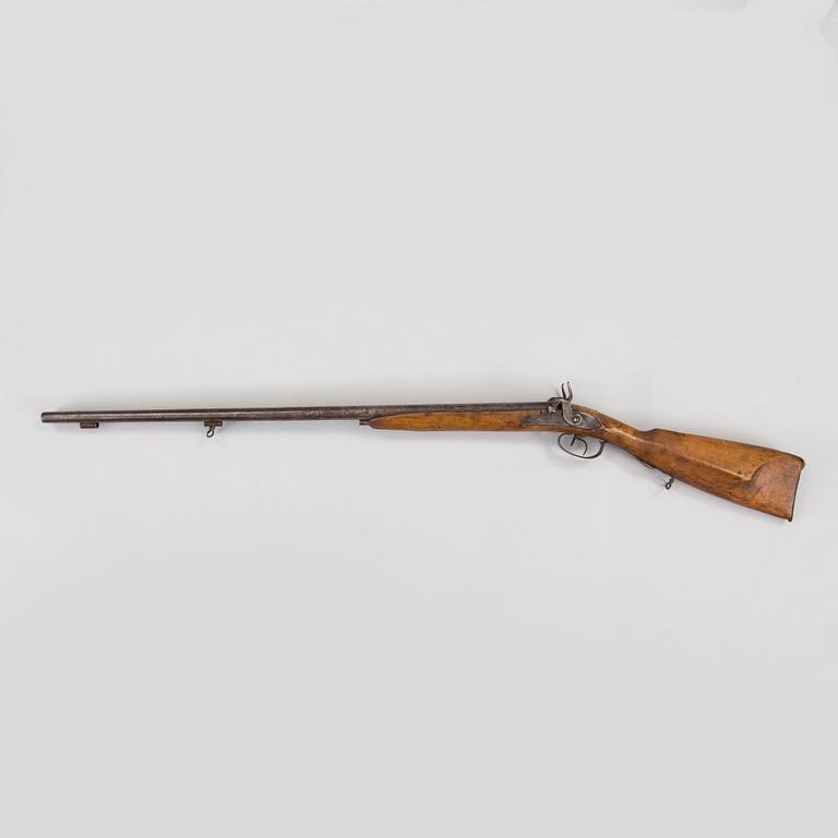 A double barrel caplock rifle mid 1800s.