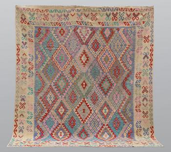 A carpet, kilim, ca 290 x 257 cm.