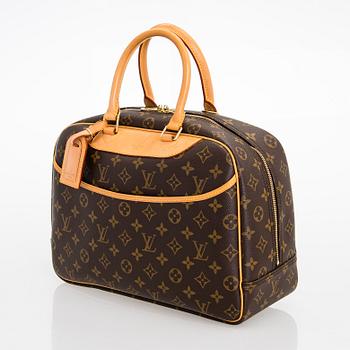 LOUIS VUITTON Monogram Trouville Bag. - Bukowskis