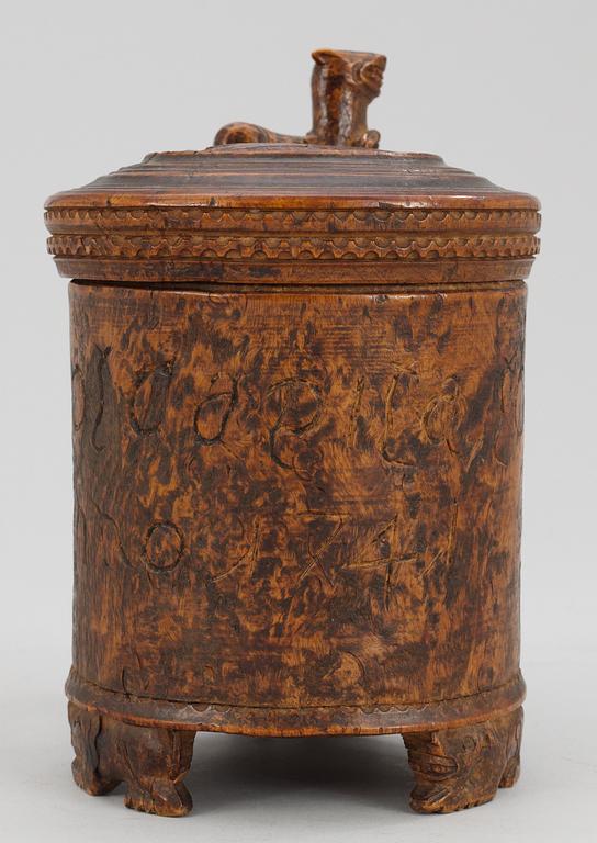 A Norwegian wooden tankard, dated 1741.