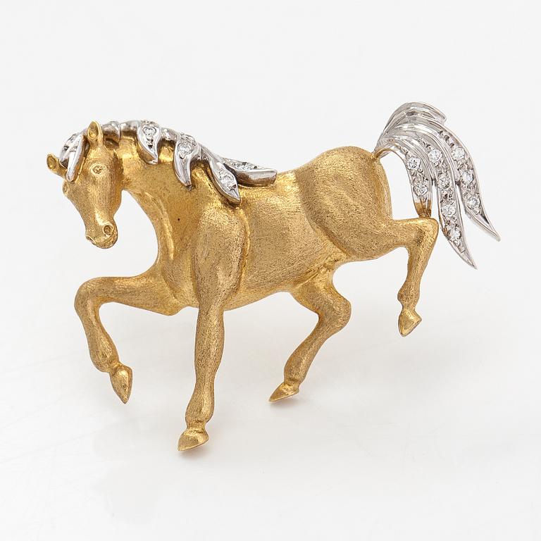 An 18K gold horse brooche with diamonds ca. 0.04 ct in total. United Kingdom.