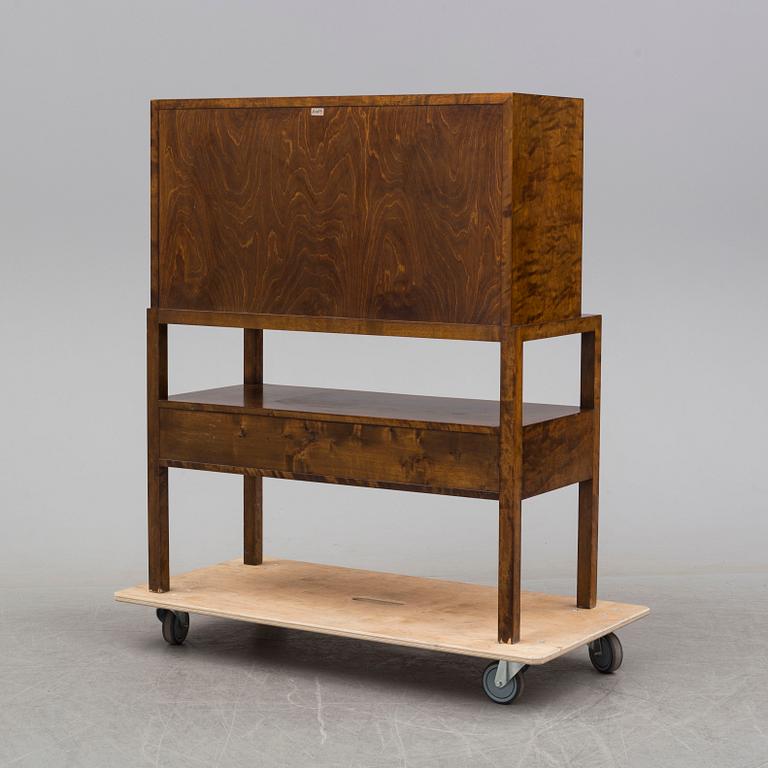 a mid 20th century birch bureau from Axel Larson, Bodafors, model number 954.