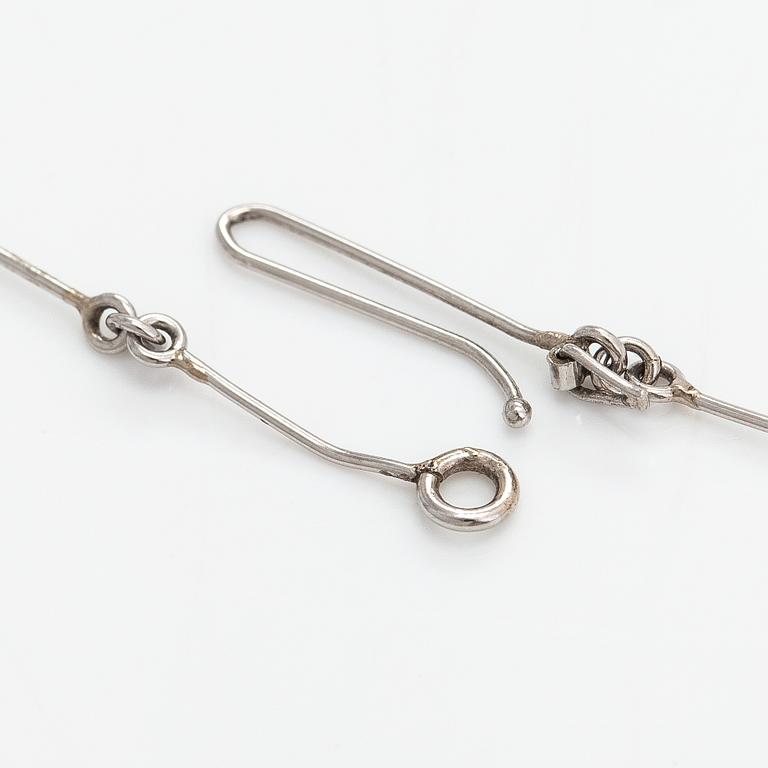 Björn Weckström, A platinum necklace "Nessos" with a ca. 0.10 ct diamond. Lapponia 1981.
