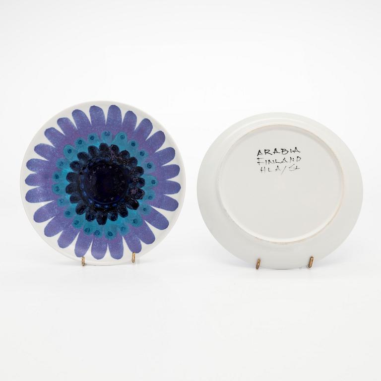 Hilkka-Liisa Ahola, a ceramic serving dish and ten side plates, signed HLA, Arabia Finland.