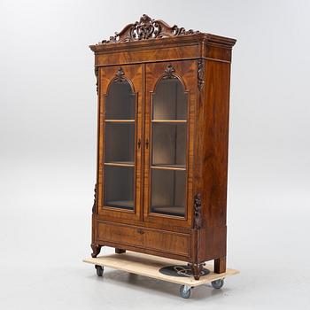 A mahogany veneered vitrine cabinet, mid 19t Century.