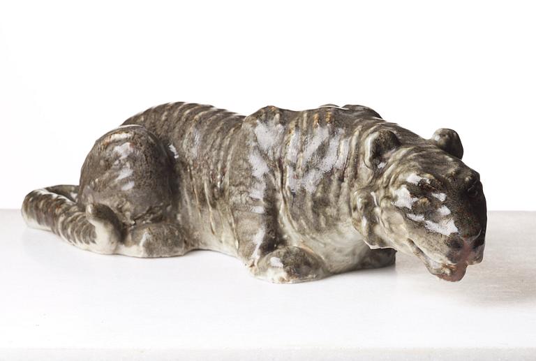 Michael Schilkin, a large stoneware sculpture of a hunting tiger, Arabia, Finland 1940's.