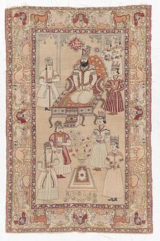 An antique Kerman Laver rug, South Persia, signed c.206 x 133 cm.
