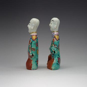 Two famille rose "laughing boys", Qing dynasty, circa 1800.