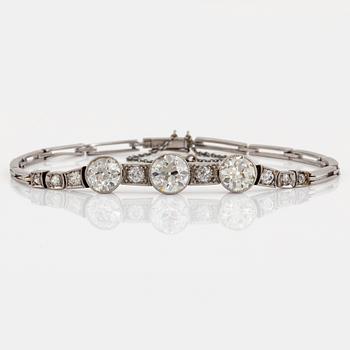 1060. A platinum bracelet set with three old-cut diamonds with a total weight of ca 3.25 cts.