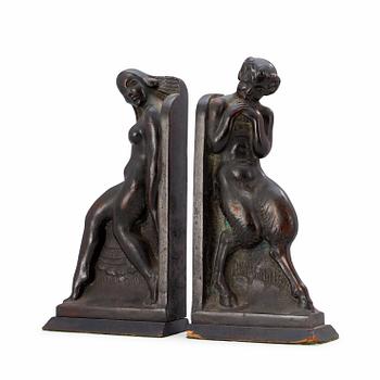 445. A pair of Axel Gute patinated bronze bookends, Sweden 1919.